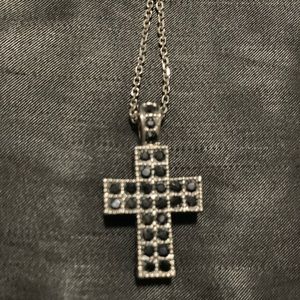 Swarovski black crystal cross necklace with 18 inch gunmetal chain.